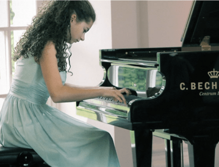 Pianist playing on C. Bechstein grand piano